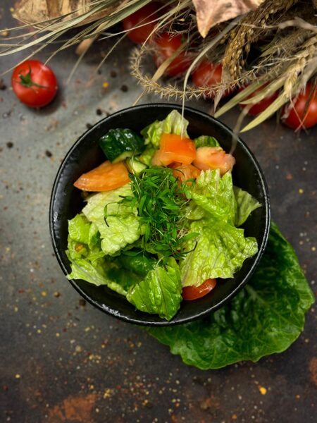 Fresh vegetable salad with olive oil