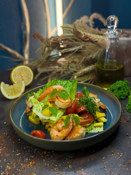 Avocado-mango salad with grilled tiger shrimps