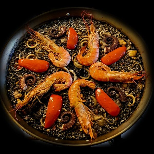 Seafood paella with cuttlefish ink (Paella Negra)