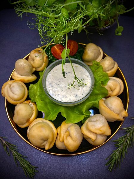 Сod fish dumplings with sauce